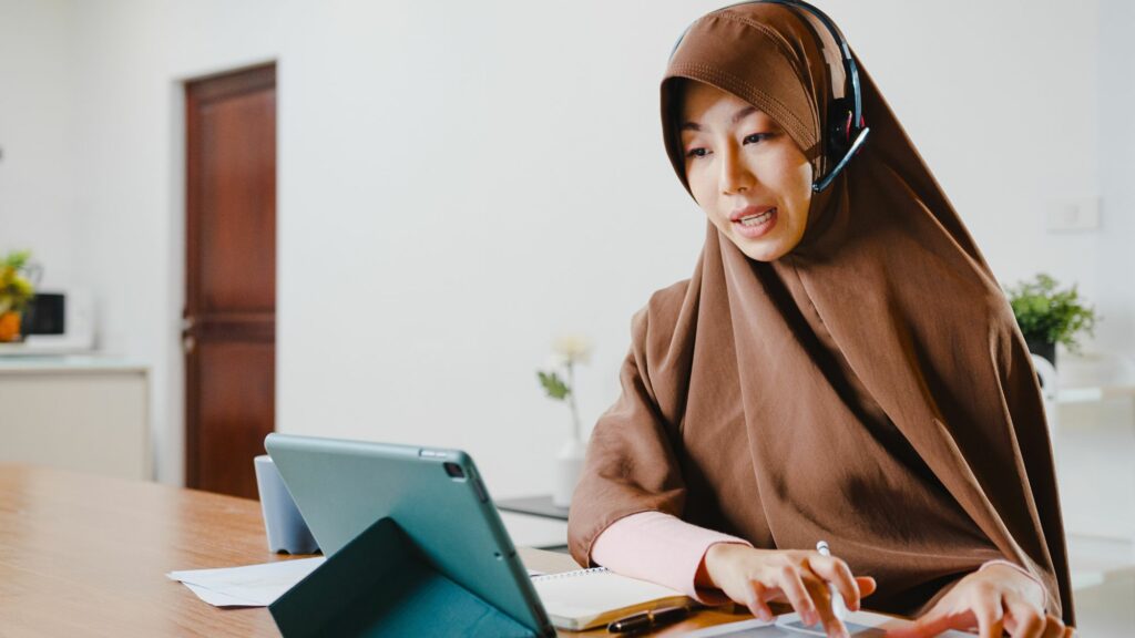 A Muslim lady giving online Quran lectures