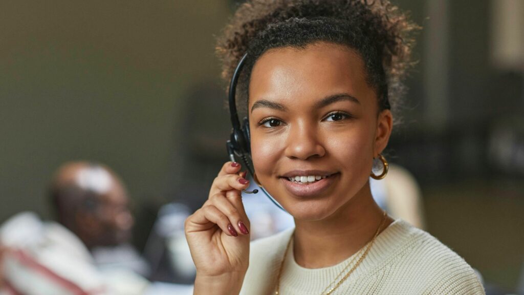 A girl in a meeting trying to sort out between telesales vs telemarketing for the best growth strategy