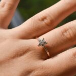 A woman wearing a diamond ring made by a leading jewelry manufacturers