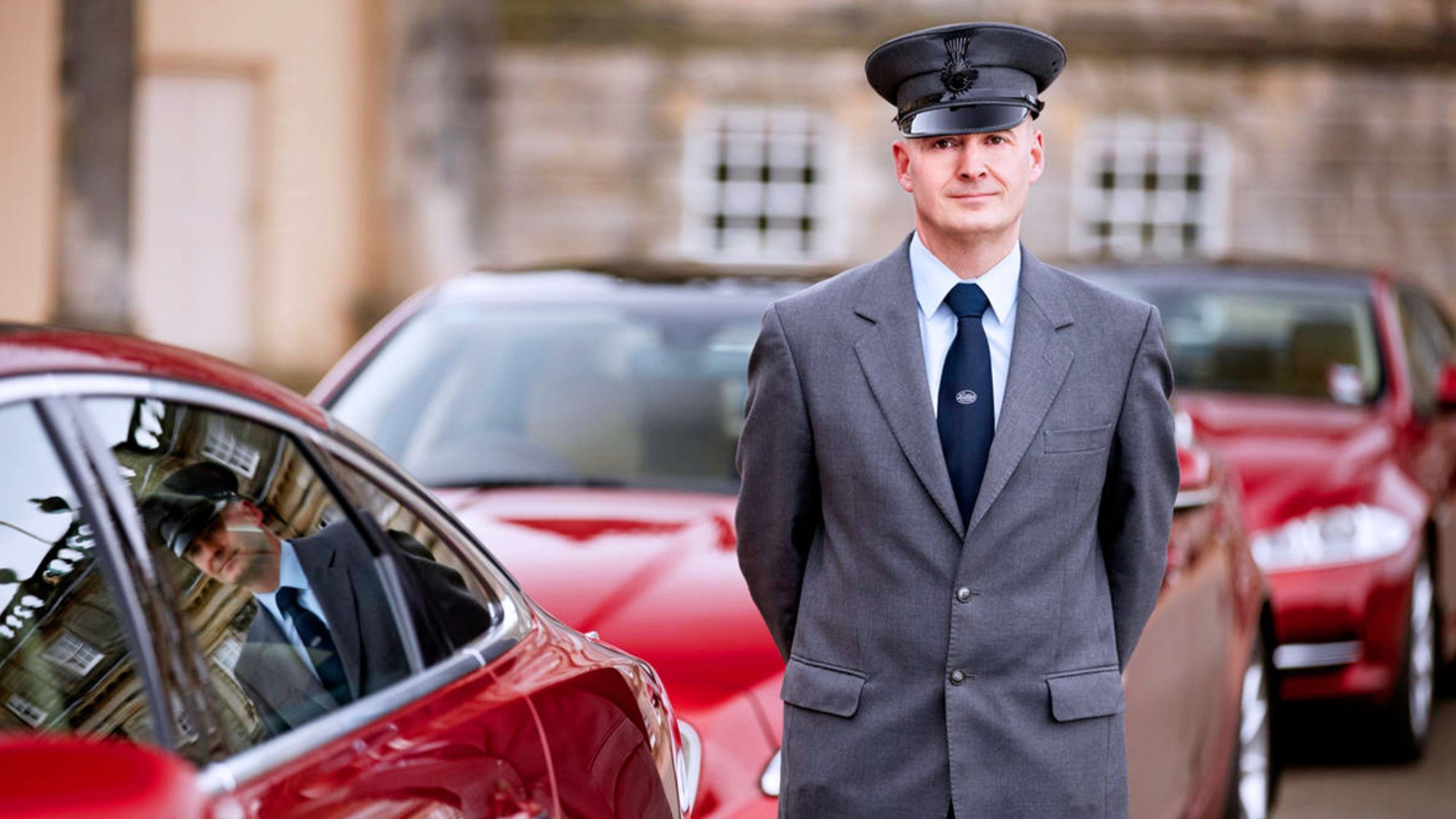 Heathrow airport transfer service man waiting for his passengers