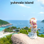 "Scenic view of Yukevalo Island with crystal-clear waters, lush greenery, and white sandy beaches."