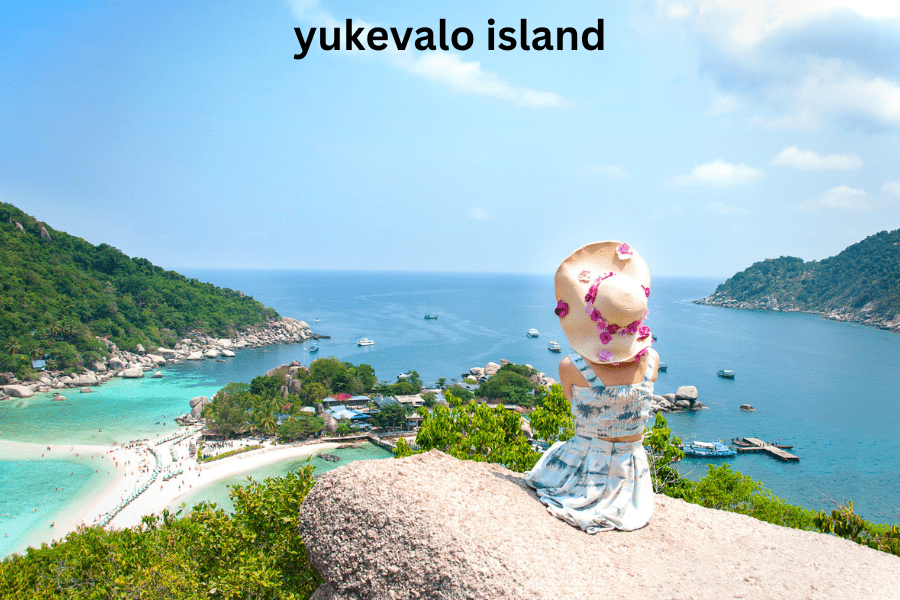 "Scenic view of Yukevalo Island with crystal-clear waters, lush greenery, and white sandy beaches."