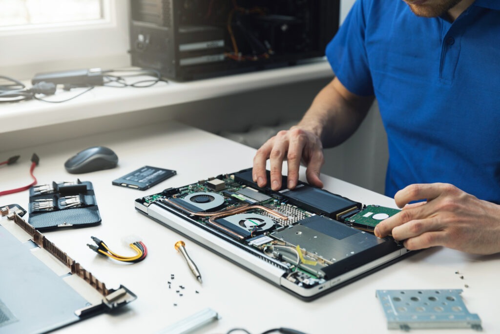 Man busy in MacBook Repair