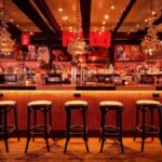 Interior of Bar Levokitz showcasing stylish stools and ambient lighting above the bar area